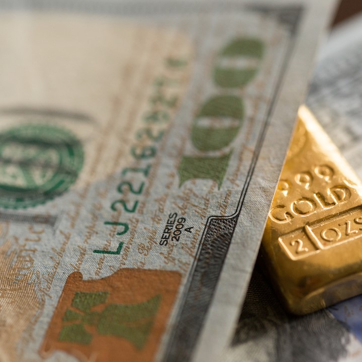 Gold Bullion Among US 100 Dollar