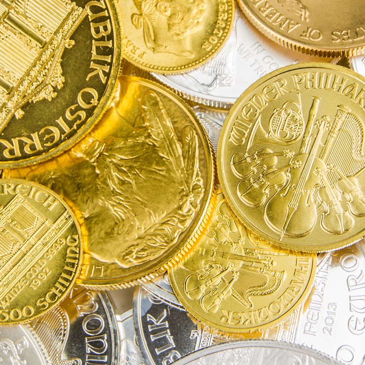 Pile Of Gold Bars Or Ingots On A Dark Background